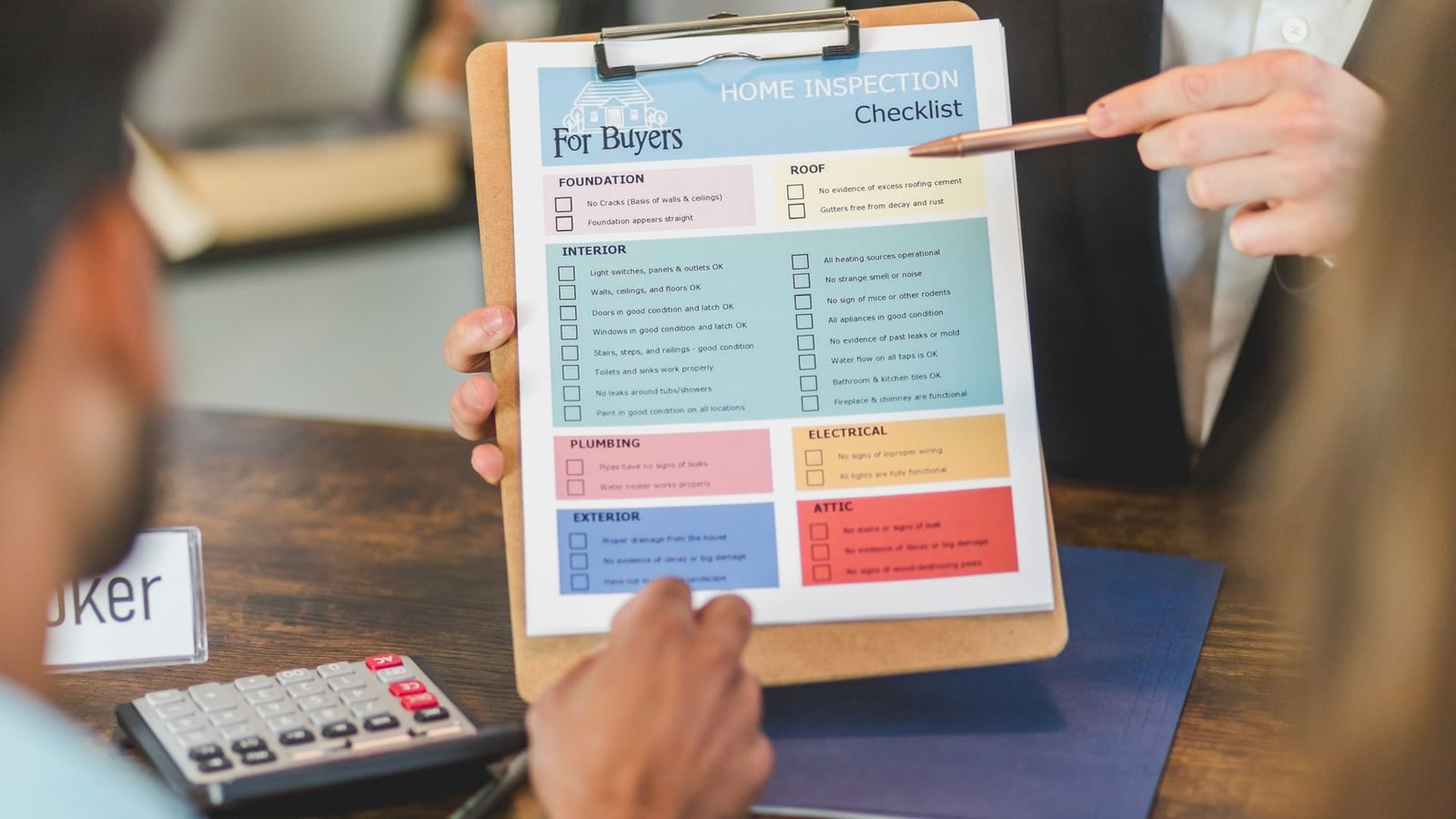 An open planner and tablet showing a checklist for creating a content brief.